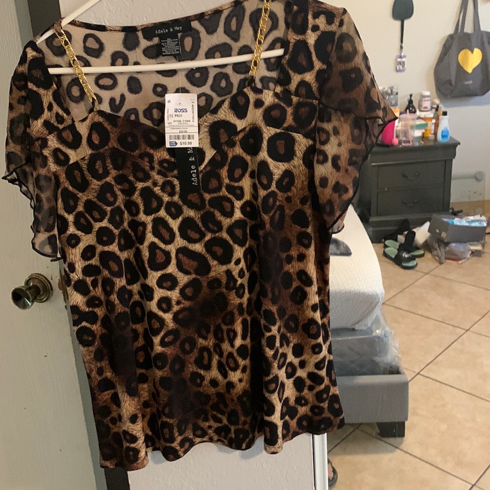 Selling a cheetah shirt brand Adele&May size:XL